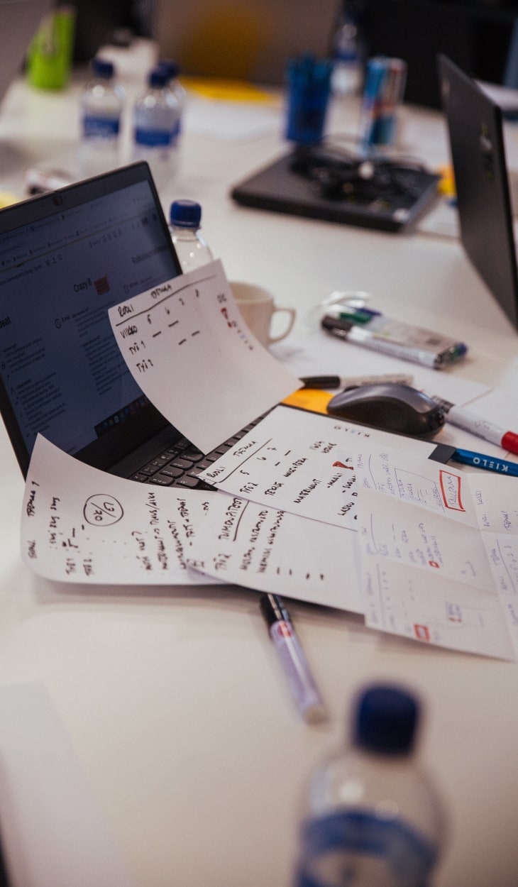 UI designs on paper.