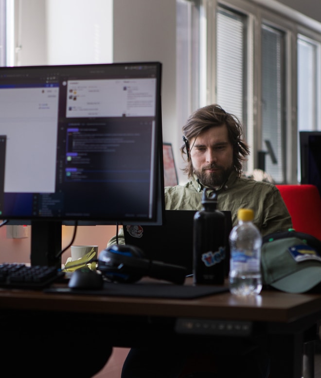 DevOps developer sitting by the table