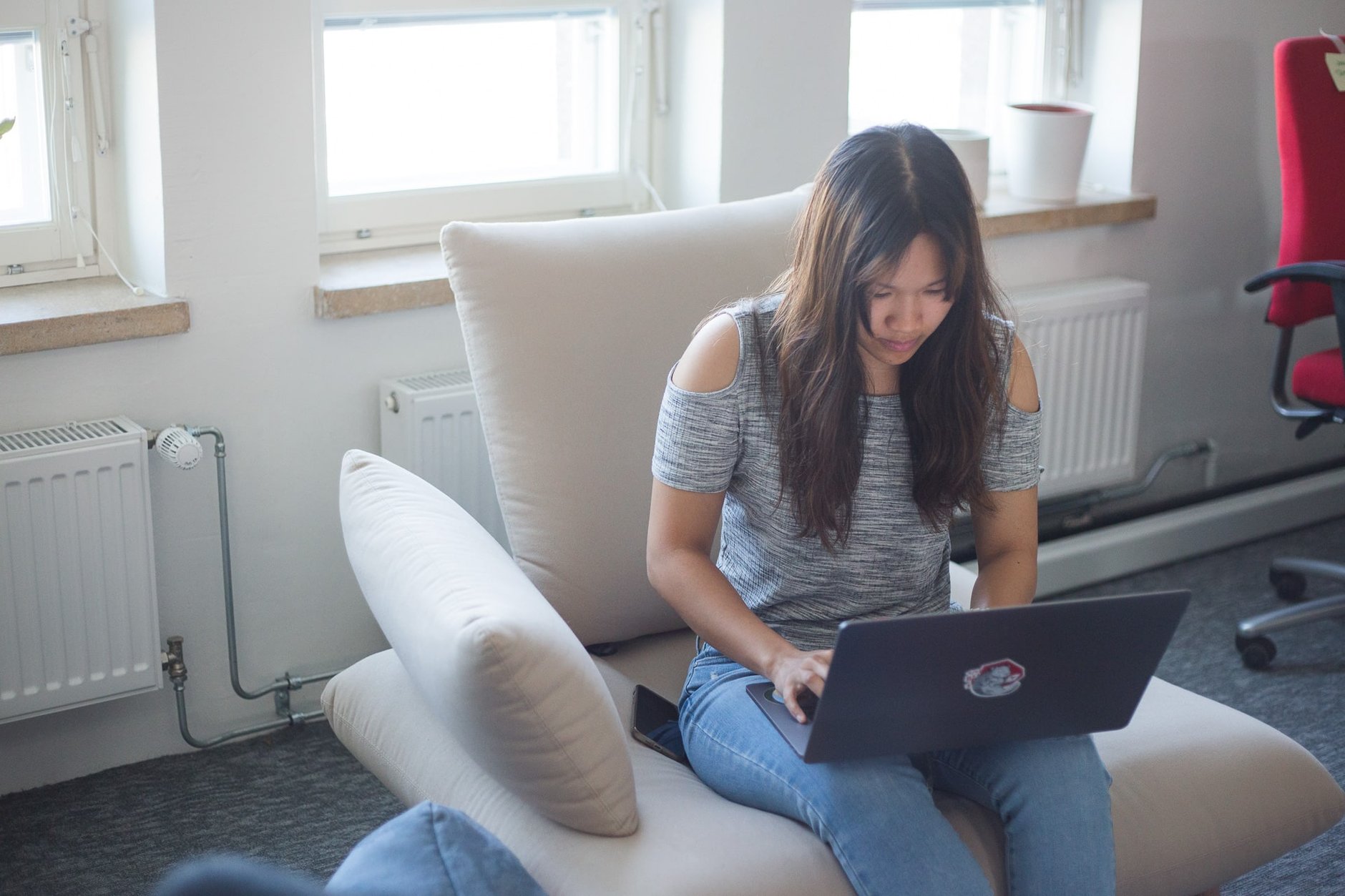 Jenny coding on her computer