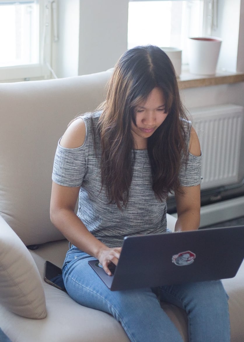 Jenny coding on her computer